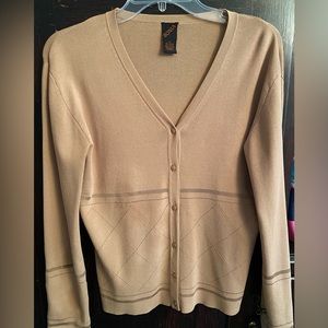 Light tan sweater with modest black decorative stitching